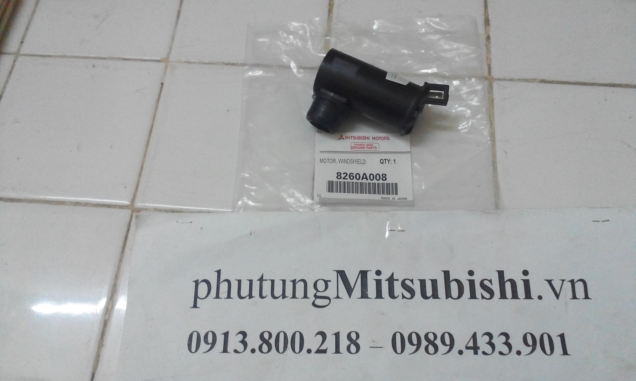 mô tơ Bơm nước rửa kính xe Mitsubishi Triton