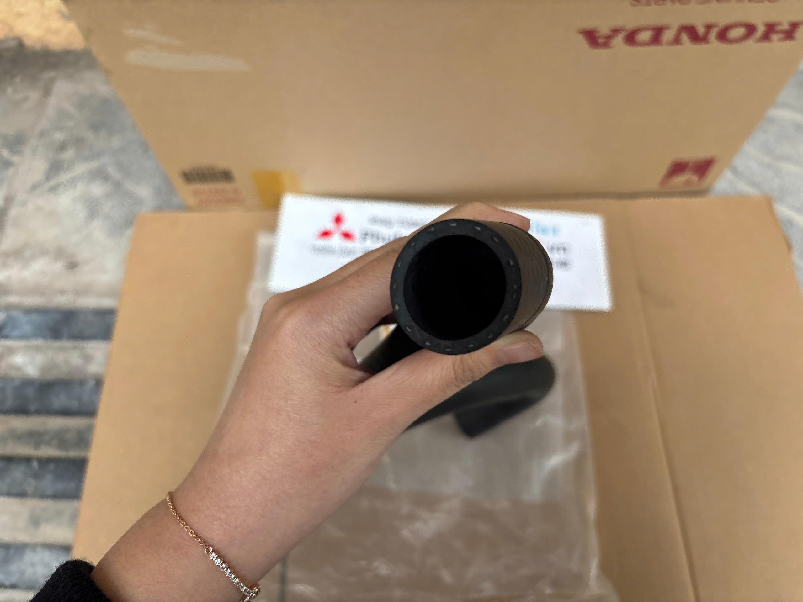 Ống cao su vào két nước xe Mitsubishi Xpander