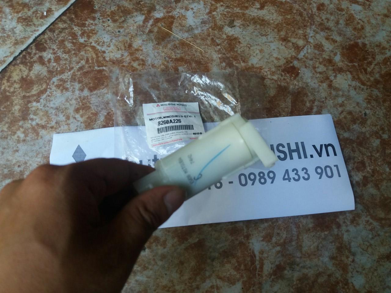 Mô tơ bơm nước rửa kính xe Mitsubishi Attrage