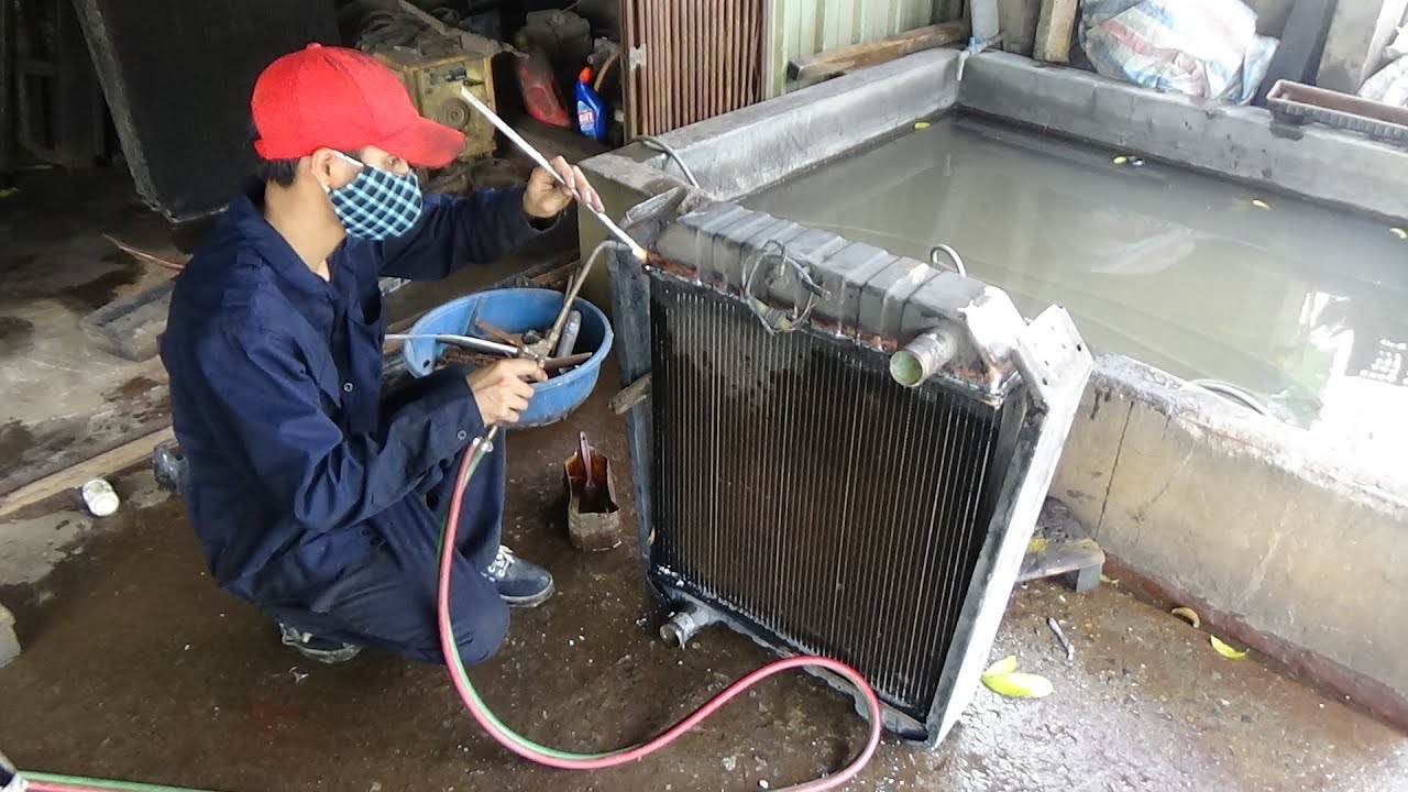 Th&ocirc;ng h&agrave;n k&eacute;t nước &ocirc; t&ocirc;