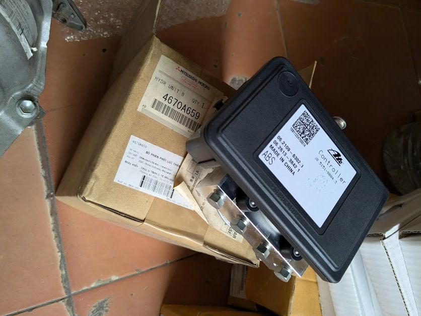 Cụm bơm ABS Mitsubishi Outlander