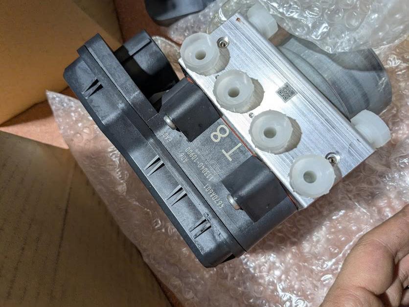 Cụm bơm ABS Mitsubishi Pajero Sport và Triton