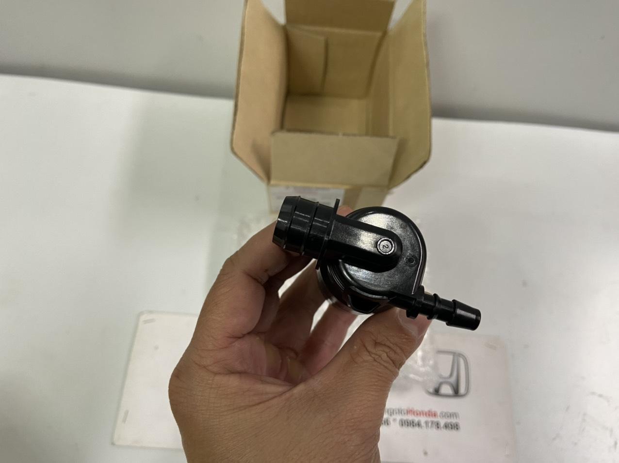 Mô tơ bơm nước rửa đèn pha xe Mitsubishi Triton 2019 