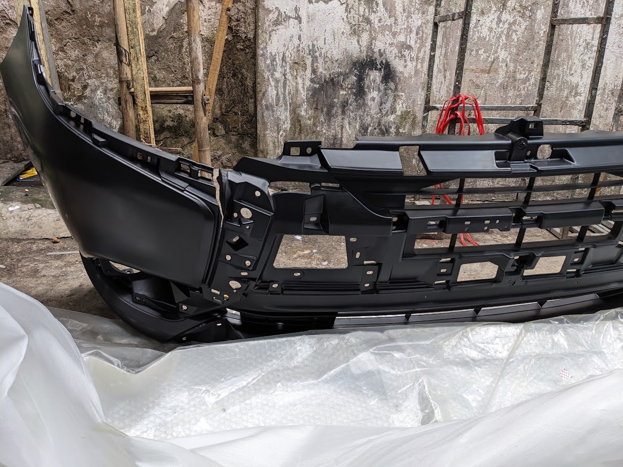 Cản trước Mitsubishi Outlander thanh lý, ba đờ sốc trước