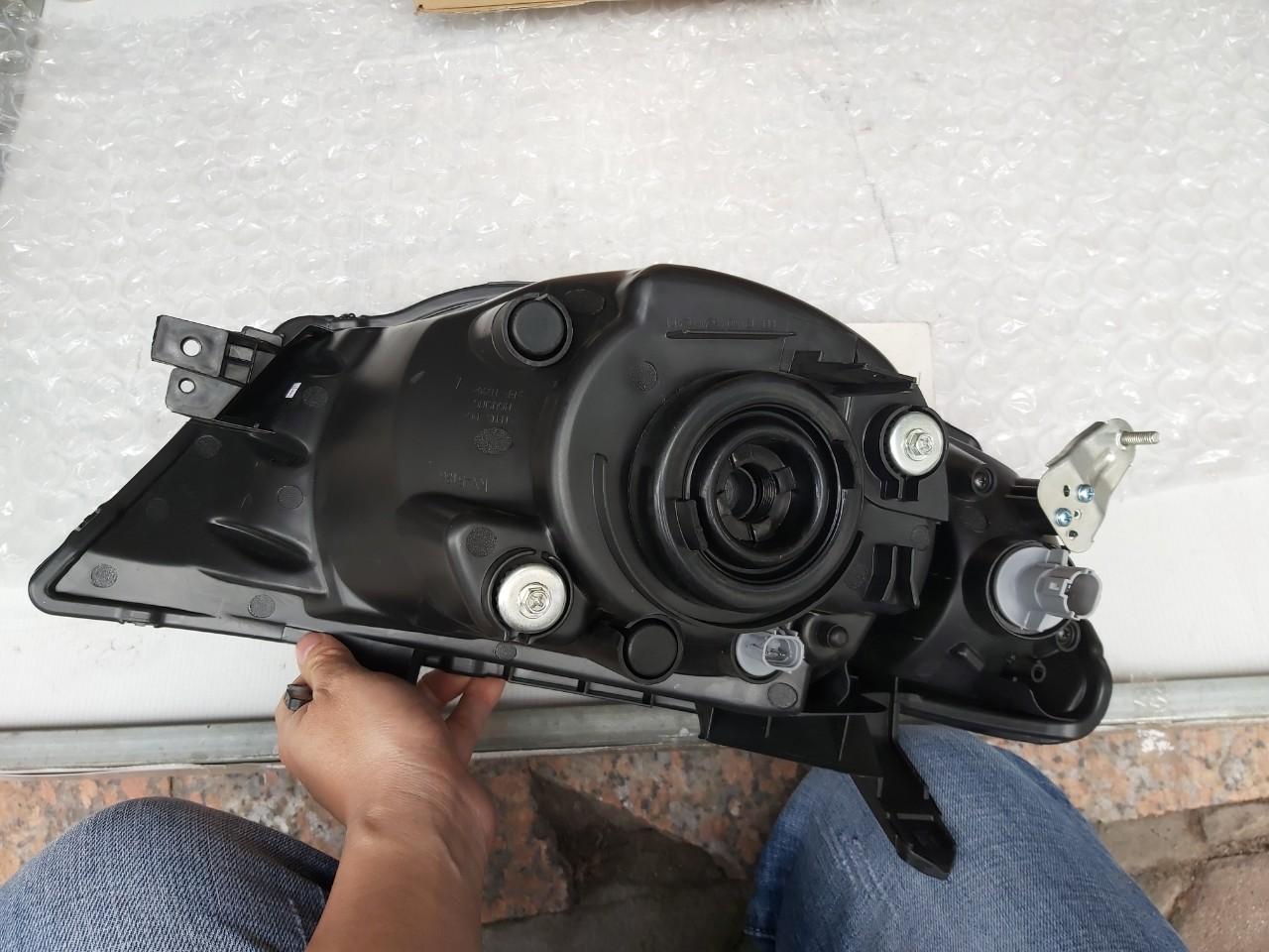 Đèn pha xe Mitsubishi Triton 2009-2015