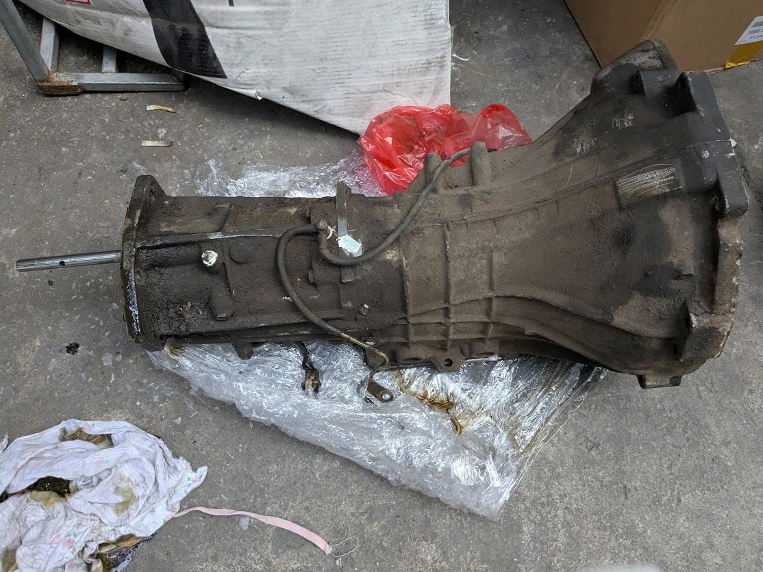 Bãi 3242A036 Hộp số chính xe số sàn  Mitsubishi Triton máy xăng ka50 kb50 kk4t Kl4t , Zinger vc4 = 5FMt=xe 2 cầu 4wd V5M21-J-GGT,GGG,GGR