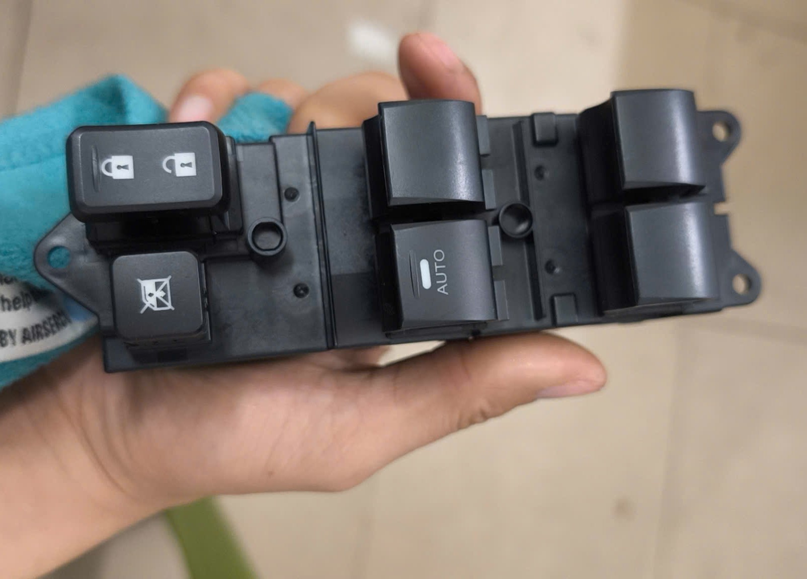 Công tắc lên xuống kính tổng cửa trước Lh (có auto) Mitsubishi Xpander, Attrage, Mirage, Triton