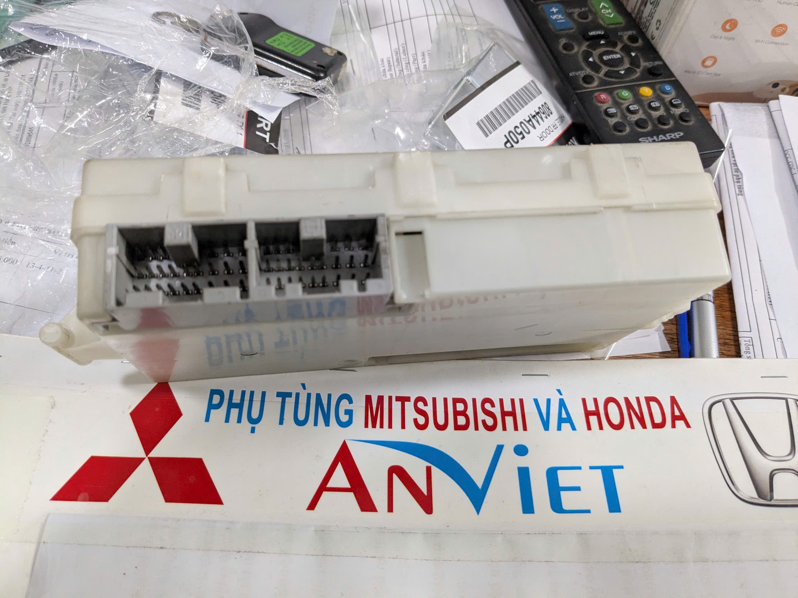 Hộp etacs Triton 4d56 2015-2018 điều khiển thời gian, đồng hồ...CONTROL UNIT,TIME & ALARM