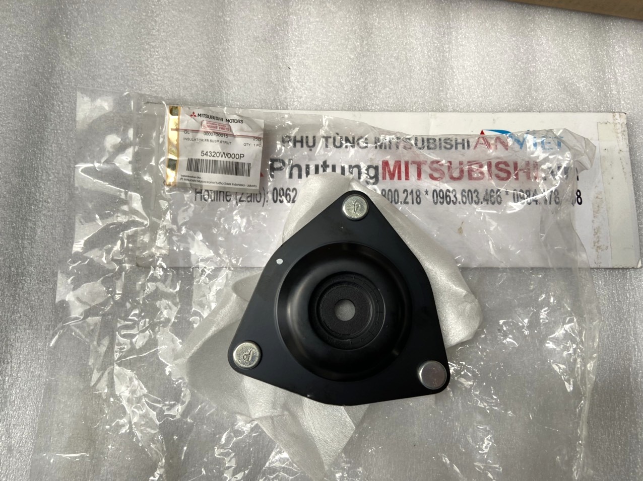 B&aacute;t b&egrave;o giảm x&oacute;c trước xe Mitsubishi Xforce