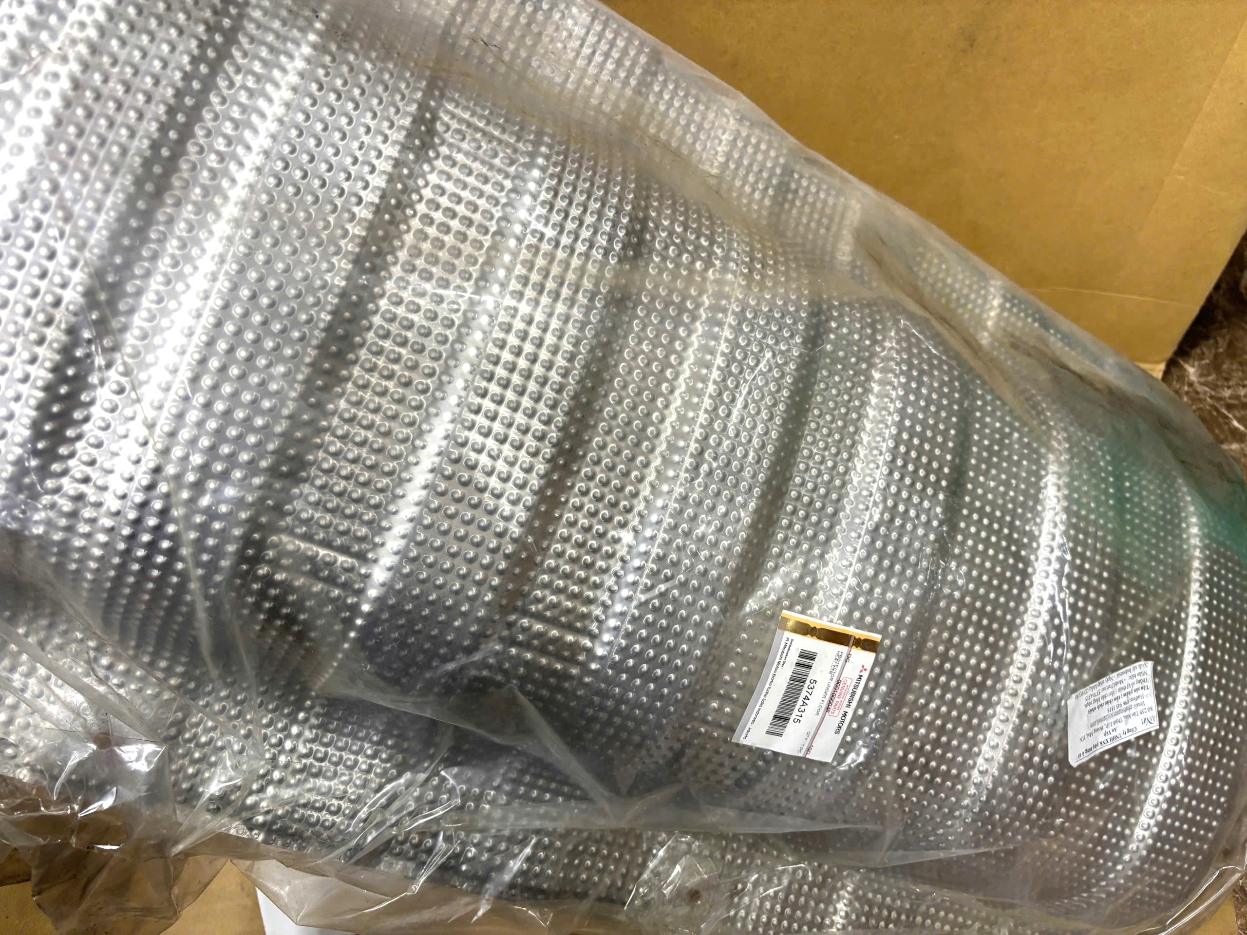 Tấm chắn nhiệt ống xả sàn xe Mitsubishi Xforce