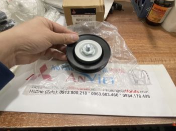 Bi tăng dây curoa điều hòa xe mitsubishi Pajero Sport chính hãng