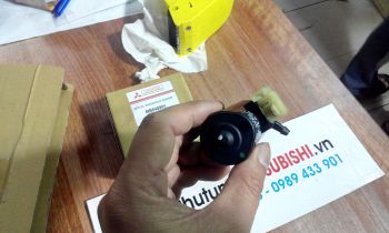 Mô tơ bơm nước rửa kính xe Mitsubishi Jolie